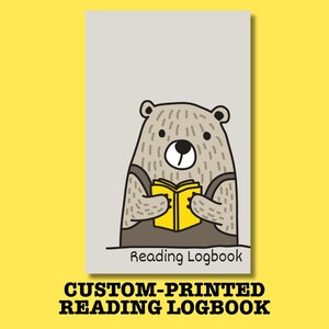 May include: A custom-printed reading logbook featuring a cartoon bear reading a yellow book. The bear is brown and wearing brown overalls. The logbook has the words "Reading Logbook" printed on it.