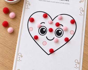 May include: A Heart Cotton Ball Art activity sheet with a central heart illustration featuring a smiling face. The page includes the text Heart Cotton Ball Art and Glue cotton balls or pom-poms on the circles. Red and pink pom-poms are placed on the heart, with a small bowl of extra pom-poms nearby.