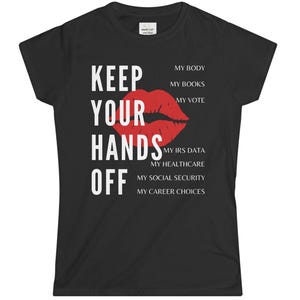 May include: Black t-shirt with white text that reads "Keep Your Hands Off" with a red lipstick print and a list of items including "My Body", "My Books", "My Vote", "My IRS Data", "My Healthcare", "My Social Security", and "My Career Choices".