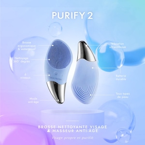 May include: Two light blue facial cleansing brushes with silver accents are displayed against a blue background. The text "PURIFY 2" is at the top. One brush has a textured surface and the other has a smooth surface. The text "SKIN FRESH" is visible on one brush.