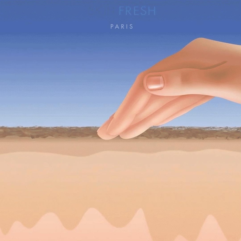 May include: Illustration of a hand gently touching a surface, with the words "FRESH PARIS" in the upper portion. The background transitions from a light blue sky to a tan surface, suggesting a skincare or beauty theme.