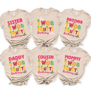 a bunch of shirts that are on a white background