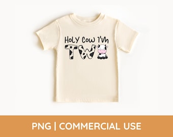 May include: Cream-colored toddler t-shirt with the phrase "Holy Cow I'm Two" in black lettering. The "T" and "W" are designed with a black and white cow pattern, and a cartoon cow is next to the "W".