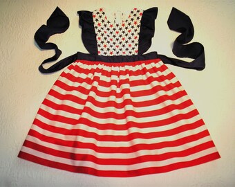 Patriotic Red White & Blue.  Pinafore dresses in size 3T and 5/6.  Whale Shortall in size 3T.  Made in USA and Ready to Ship