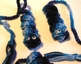 12 Crocheted Bookworms with moving eyes.  Choice of colors. Motivate your children to read.  Approximately 15" long.