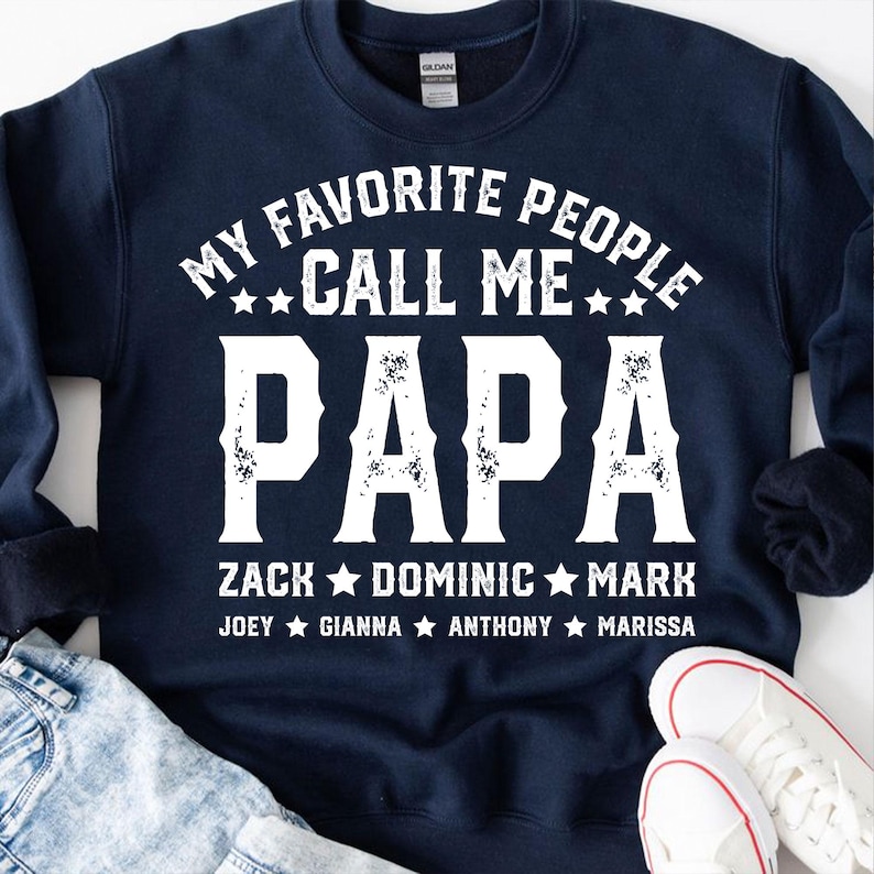 May include: Navy blue sweatshirt with white text that reads "My Favourite People Call Me Papa Zack Dominic Mark Joey Gianna Anthony Marissa".