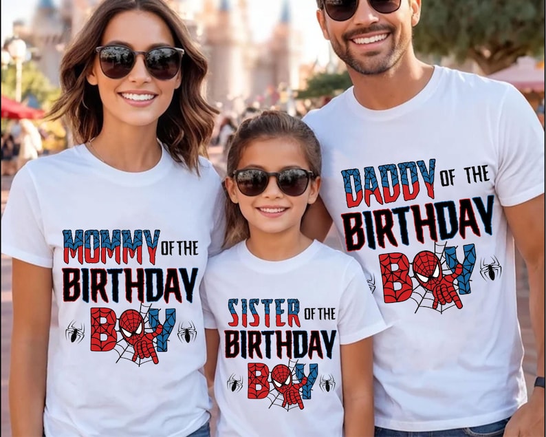 May include: A family of four wearing white t-shirts with a Spiderman theme. The shirts say "Mommy of the Birthday Boy", "Daddy of the Birthday Boy", "Sister of the Birthday Boy", and a Spiderman graphic.