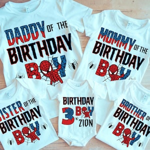 May include: Set of five white t-shirts with a Spiderman theme. The shirts say "Daddy of the Birthday Boy", "Mommy of the Birthday Boy", "Sister of the Birthday Boy", "Brother of the Birthday Boy", and "Birthday Boy Zion".