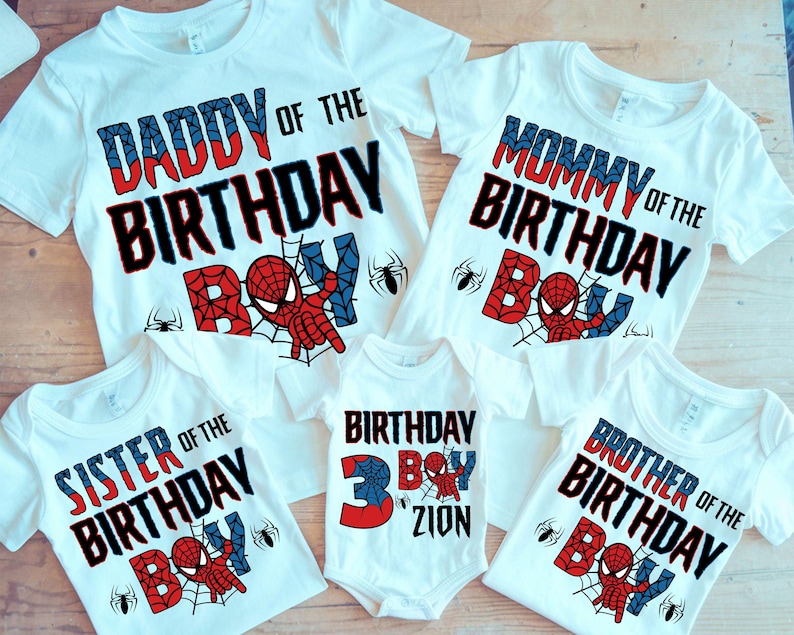May include: Set of five white t-shirts with a Spiderman theme. The shirts say "Daddy of the Birthday Boy", "Mommy of the Birthday Boy", "Sister of the Birthday Boy", "Brother of the Birthday Boy", and "Birthday Boy Zion".