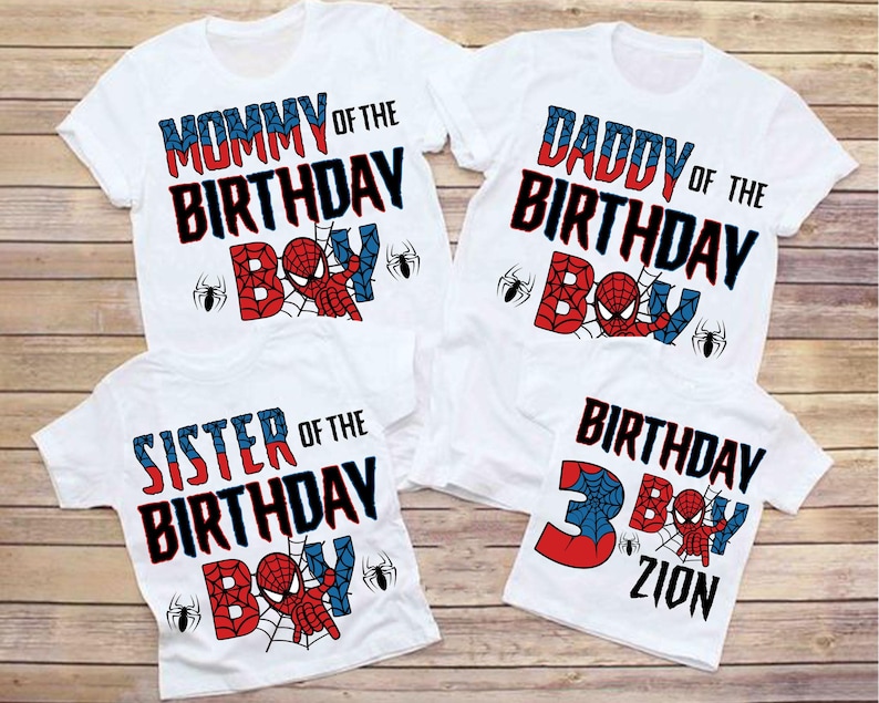 May include: Four white t-shirts with red, blue, and black Spiderman graphics. The shirts say "Mommy of the Birthday Boy", "Daddy of the Birthday Boy", "Sister of the Birthday Boy", and "Birthday Boy Zion".