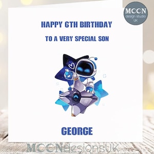 May include: A white birthday card with blue text reading "HAPPY 6TH BIRTHDAY TO A VERY SPECIAL SON". The card features a cartoon character in blue and white, and the name "GEORGE" is printed at the bottom.