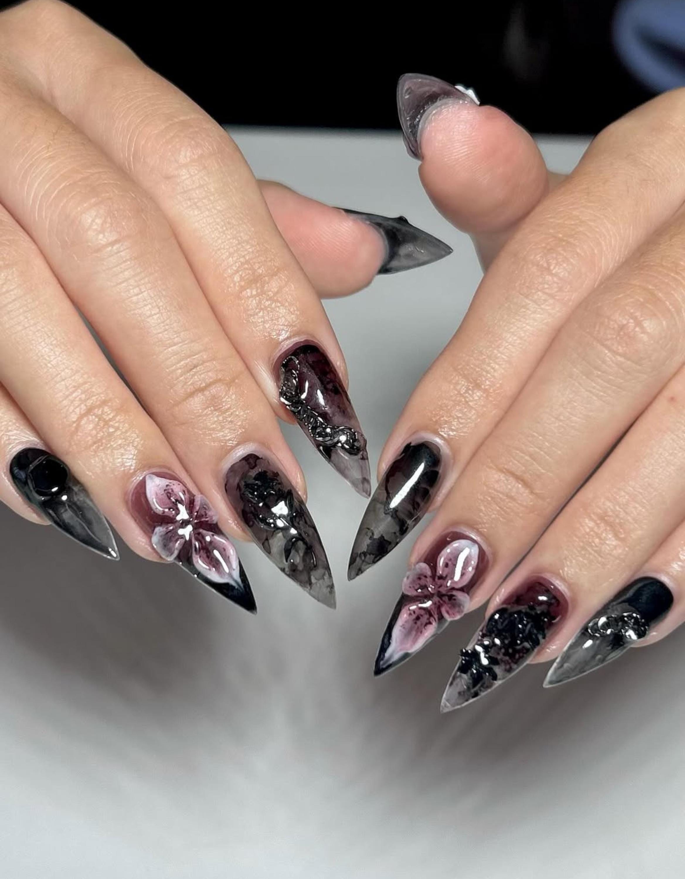 Black Floral Motif Nails That Shine