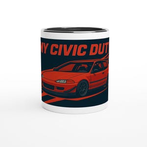 May include: White ceramic mug with a black interior. The design features a red car illustration and the text "MY CIVIC DUTY" in red. The car is set against a dark blue background. A mug for car enthusiasts.