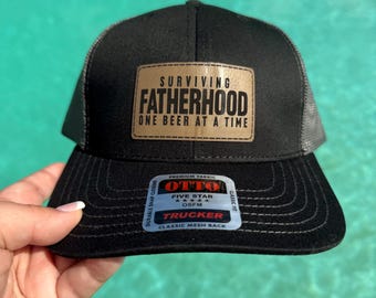 Surviving Fatherhood Leather Patch Hat: Kesha Dan Otto Snapback