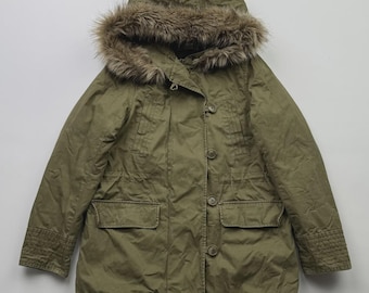 May include: Olive green parka-style jacket with a fur-lined hood. The jacket features a button-up front, two front pockets, and ribbed cuffs. The hood is trimmed with brown faux fur. A casual, outerwear garment.