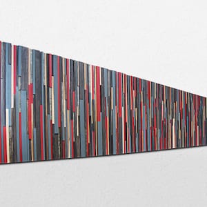 May include: Abstract wall art made of wood with vertical strips of red, blue, and gray paint.