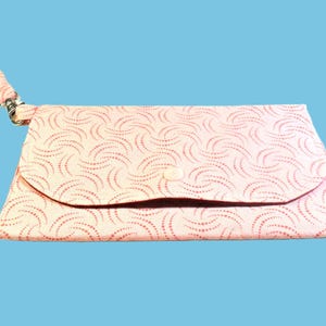Cartera de mano rosa