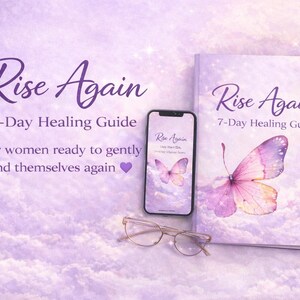 May include: A book and a smartphone with the title "Rise Again" and the subtitle "7-Day Healing Guide". The book cover and phone screen feature a butterfly illustration. The image also includes a pair of eyeglasses.