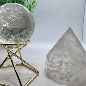 Natural Crystal Clear Quartz Sphere(1.8”)  with Diamond shape (2.3”) carving. Rainbow flash with stunning clarity! *holder not included*