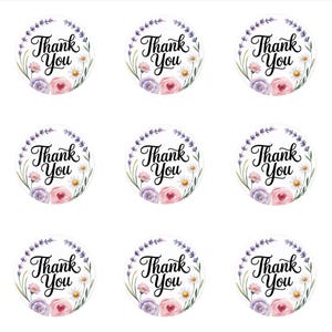 May include: Nine round stickers with a floral design. Each sticker has the words "Thank You" in elegant script, surrounded by a wreath of lavender, daisies, and roses in shades of pink and purple.