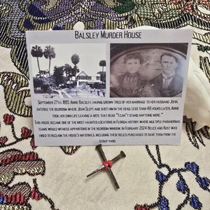 May include: A black and white photo of a house with a caption about the Balsley Murder House. The caption describes the murder-suicide that occurred in the house in 1893 and the paranormal activity that has been reported there since. The photo is accompanied by a close-up of a rusty nail cross.