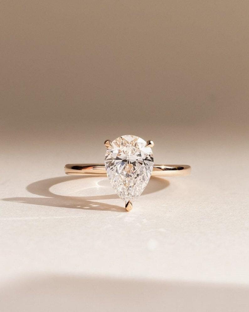 Pear Cut Moissanite Engagement Ring, Three Prong Solitaire, Anniversary ...