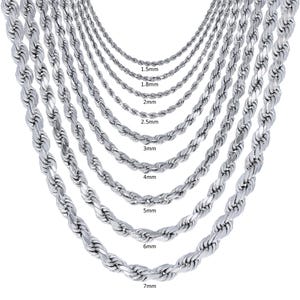 May include: A set of silver rope chains in various sizes, ranging from 1.5mm to 7mm in diameter. The chains are laid out in a graduated pattern, with the smallest chain at the top and the largest chain at the bottom.
