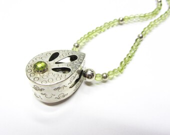 sterling silver and peridot hollow ware pendant and necklace