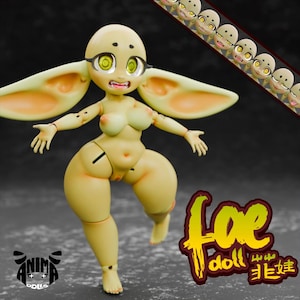 May include: A light yellow doll with large ears, green eyes, and a wide mouth. The doll is in a dynamic pose, with one leg raised. The image includes the text "Foe Doll" in yellow and a logo in the bottom left corner.