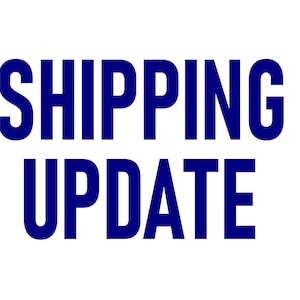 May include: The words "SHIPPING UPDATE" are displayed in bold, dark blue letters against a white background. The text is centered and takes up most of the image.