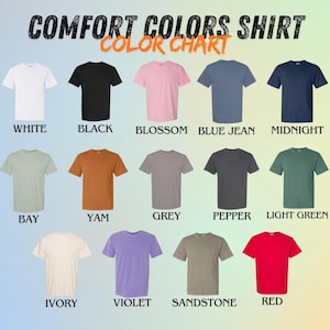 May include: A color chart displaying Comfort Colors shirts in various hues. Colors include white, black, pink, blue, and navy. Additional colors are green, orange, grey, dark grey, light green, cream, purple, tan, and red. Text at the top reads "Comfort Colors Shirt Color Chart."