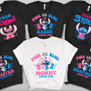May include: Five black and white t-shirts with a pink or blue theme. The shirts feature a cartoon Stitch character with the text "Team Angel", "Pink or Blue Daddy Loves You", "Team Stitch", "Pink or Blue Sister Loves You", and "Pink or Blue Mommy Loves You".