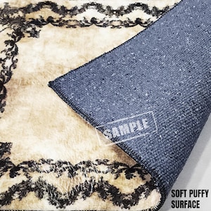 a rug with a black and white design on it
