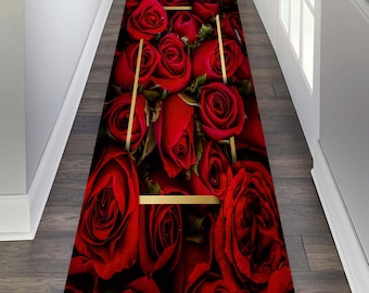 May include: A red rose runner rug with a gold frame. The rug is made of a soft, plush material and features a beautiful floral design.