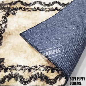 a rug with a black and white design on it