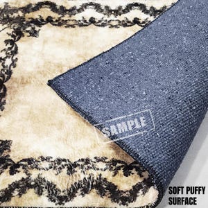 a rug with a black and white design on it
