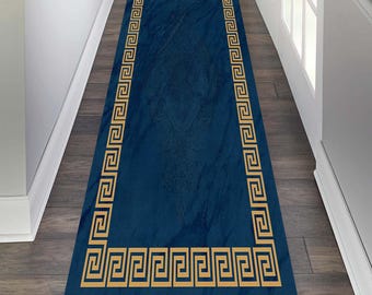 May include: A blue runner rug with a gold Greek key border. The rug is made of a soft, durable material and is perfect for adding a touch of elegance to any home.