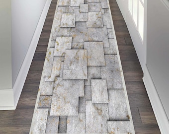 May include: A grey and white patterned runner rug with a geometric design. The rug has a subtle texture and a white border.