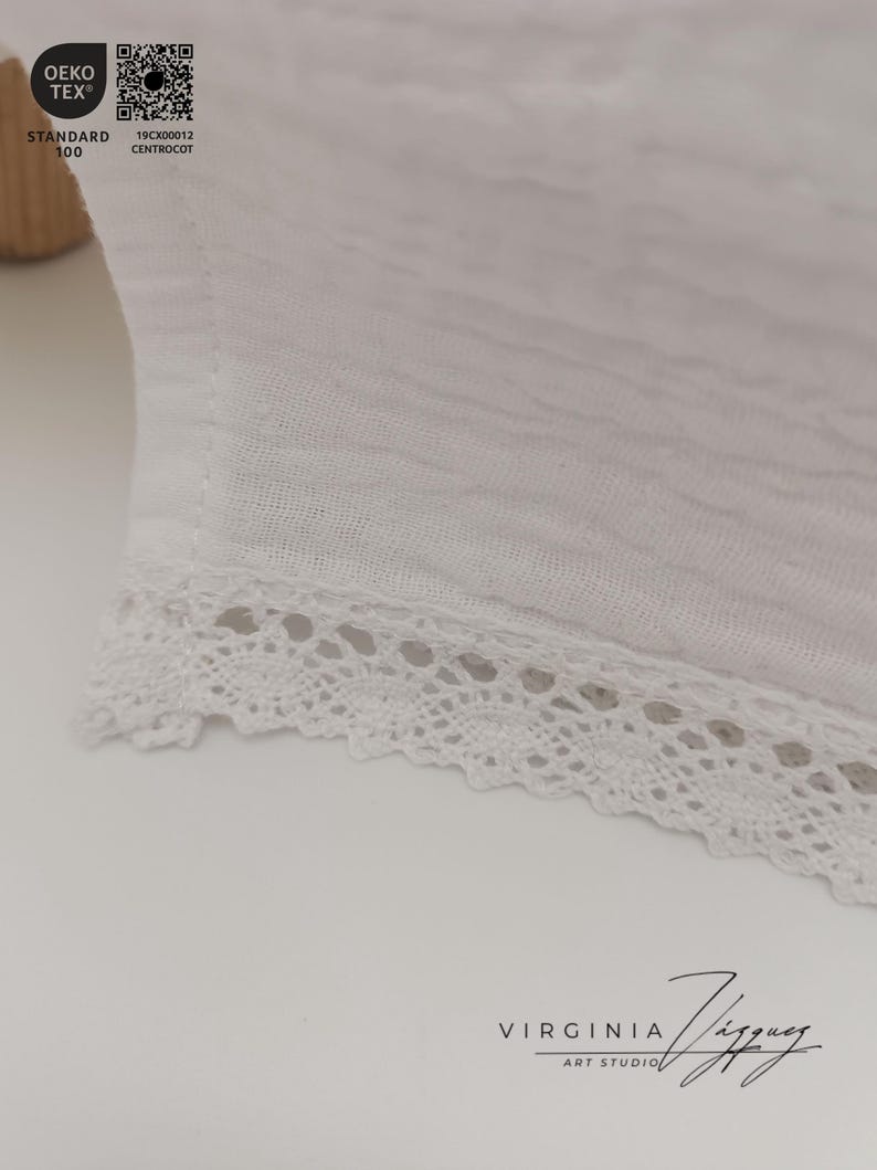 May include: White fabric with a lace trim. The fabric has a textured, slightly wrinkled appearance. The text "Oeko-Tex Standard 100" and a QR code are visible in the top left corner. The text "VIRGINIA Jiggy ART STUDIO" is visible in the bottom right corner.