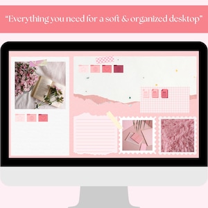 May include: A computer monitor displaying a soft pink and white desktop design. The screen features a collage with a book, flowers, sticky notes, and a textured pink background. Text at the top reads, "Everything you need for a soft & organized desktop."