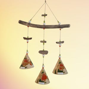 May include: A set of three ceramic mugs with a speckled, matte finish. The mugs are in shades of cream, light gray, and dark gray. Each mug has a simple, minimalist design, perfect for coffee or tea.