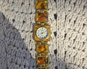 Brown abalone gold vintage watch