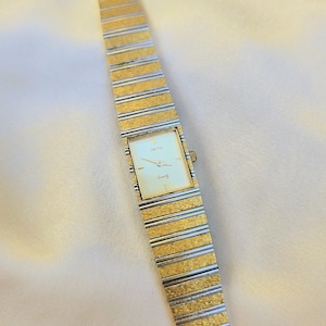 Unique gold and silver vintage watch