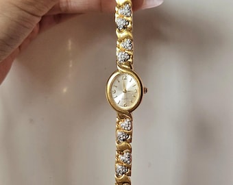 Gold rhinestone hearts vintage watch