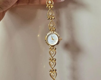 Gold rhinestone hearts vintage watch