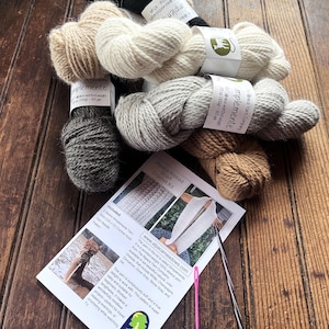 May include: A rustic wooden sign with the text "Welcome to our home" in a handwritten style. The sign has a distressed finish and a simple, inviting design, ideal for a front porch or entryway.