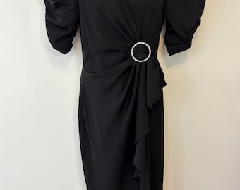 BB Collections black wrap dress rhinestone waist detail