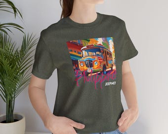May include: A dark green t-shirt with a colorful illustration of a jeepney, a type of public transportation in the Philippines. The text "Philippines Jeepney" is printed below the illustration.