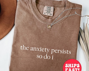 不安は続く 心地よい色のシャツ：メンタルヘルス皮肉Tシャツ