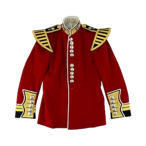May include: A red military jacket with gold and black accents. The jacket features a high collar, epaulettes, and decorative buttons. The cuffs and shoulders are adorned with gold trim and black stripes. A white trim outlines the front.